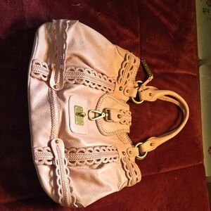 Chic Pink Shoulder Bag with Intricate Detailing